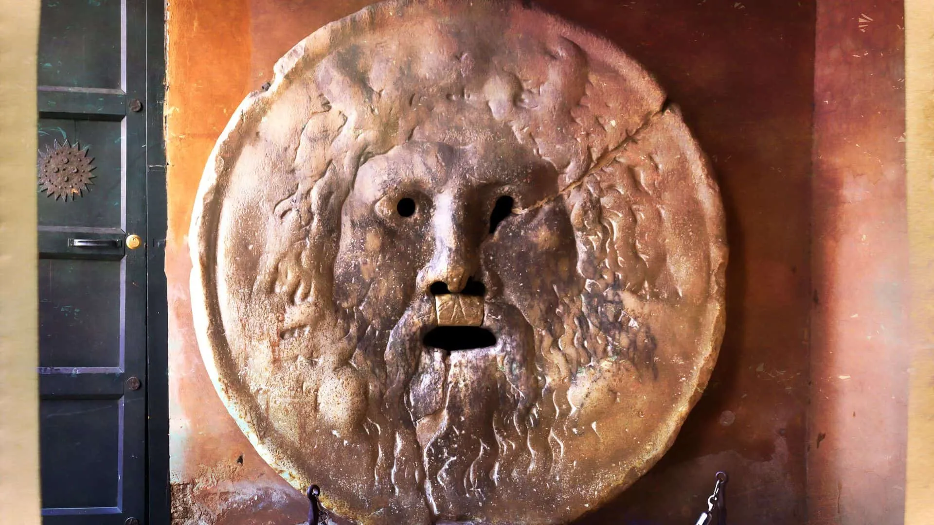 The Bocca della Verita marble mask in the portico of Santa Maria in Cosmedin