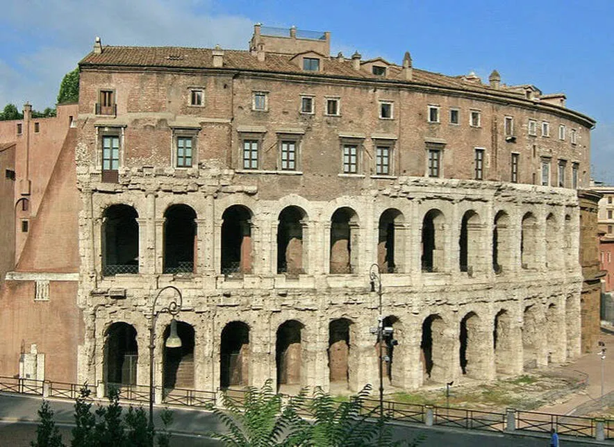 The Theatre of Marcellus with its arched facade, apartments visible on upper floors